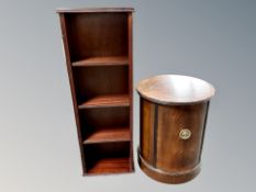 A reproduction mahogany revolving bookcase together with cylindrical cabinet