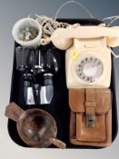A vintage plastic telephone together with folk art bowl in the form of a bird,
