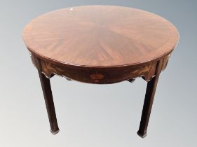 An inlaid mahogany circular occasional table,