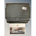 Three Porsche Driver's Manuals/Owner Booklets in Original Black Wallets : Panamera; Panamera;