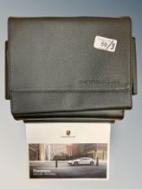 Three Porsche Driver's Manuals/Owner Booklets in Original Black Wallets : Panamera; Panamera;