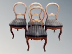 A set of four 19th century balloon backed chairs