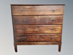 A 19th century oak four drawer chest,