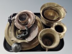 A group of Oriental brass and copper wares, mortar, engraved brass charger,