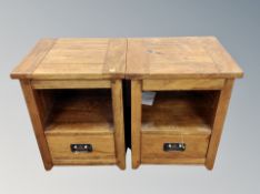 A pair of contemporary oak bedside stands