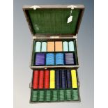 A set of early Twentieth Century gaming counters/croupiers chips, in various colours and shapes,