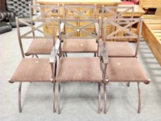 A set of six wrought metal chairs
