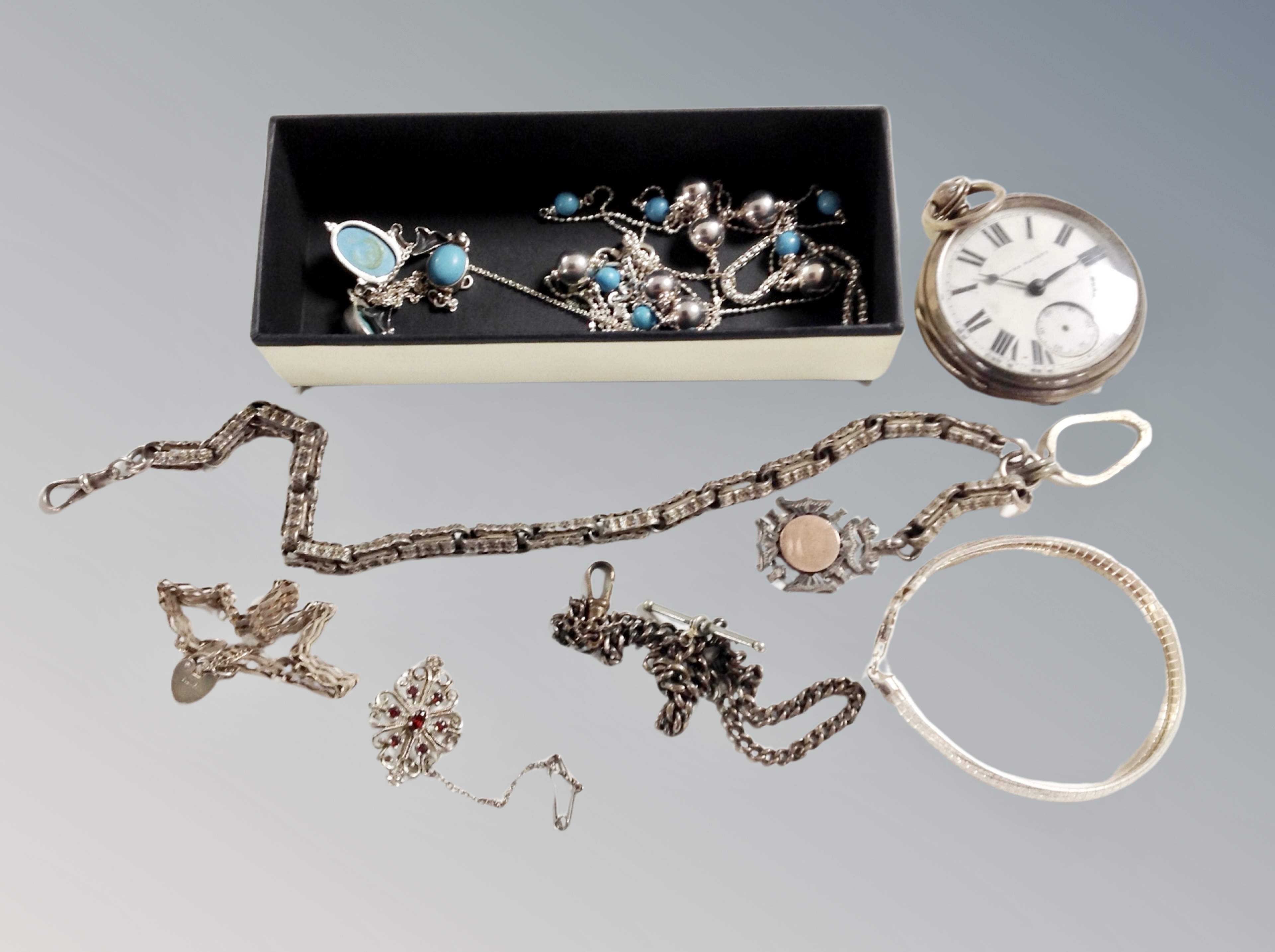 A silver open faced pocket watch together with further silver jewellery, padlock bracelet,