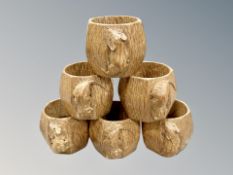 Mouseman : A set of six Robert Thompson English oak napkin rings.