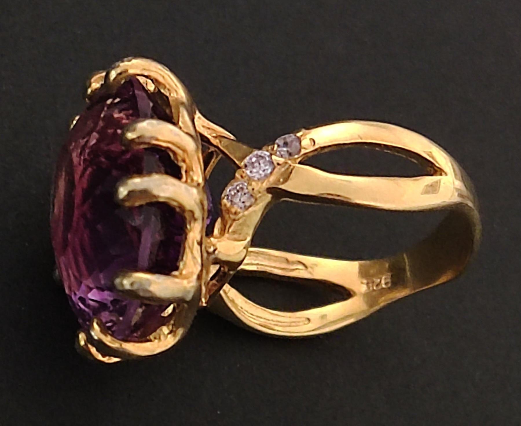 An African silver-gilt amethyst ring, 18x14 mm main stone, with cubic zirconia secondary stones, - Image 3 of 3