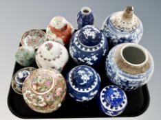 A group of Chinese porcelain ginger jars decorated with prunus, similar lamp base,