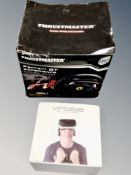A Vertoba virtual reality head set in box together with Ferrari GT racing wheel in box