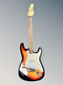 An Encore Stratocaster style electric guitar