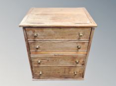 A 19th century oak commode chest width 61 cm together with an upholstered foot stool