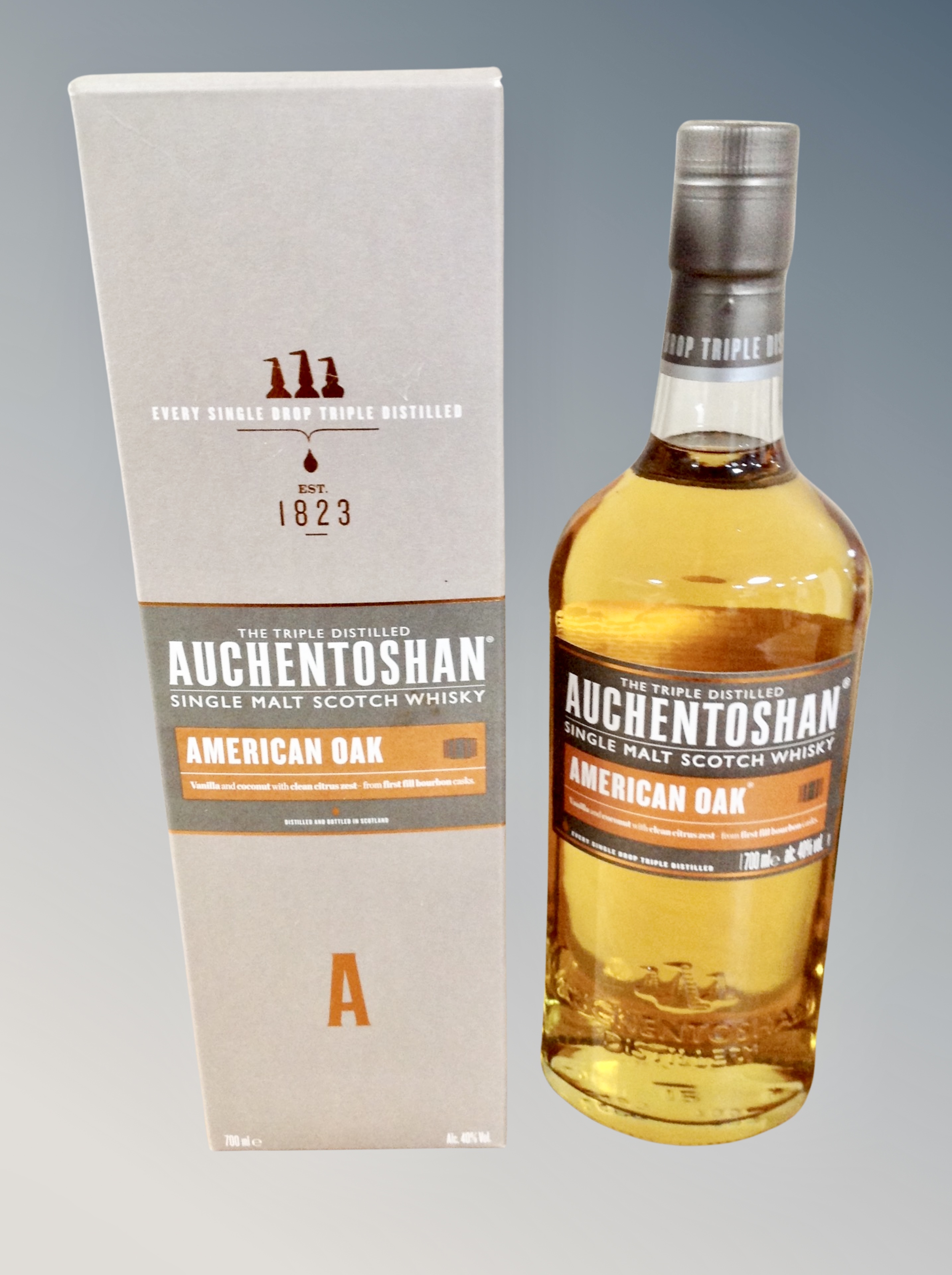 A bottle of Auchentoshan triple distilled single malt scotch whisky American oak 700ml, 40% vol,