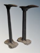 A pair of cast iron cobbler's shoe trees,