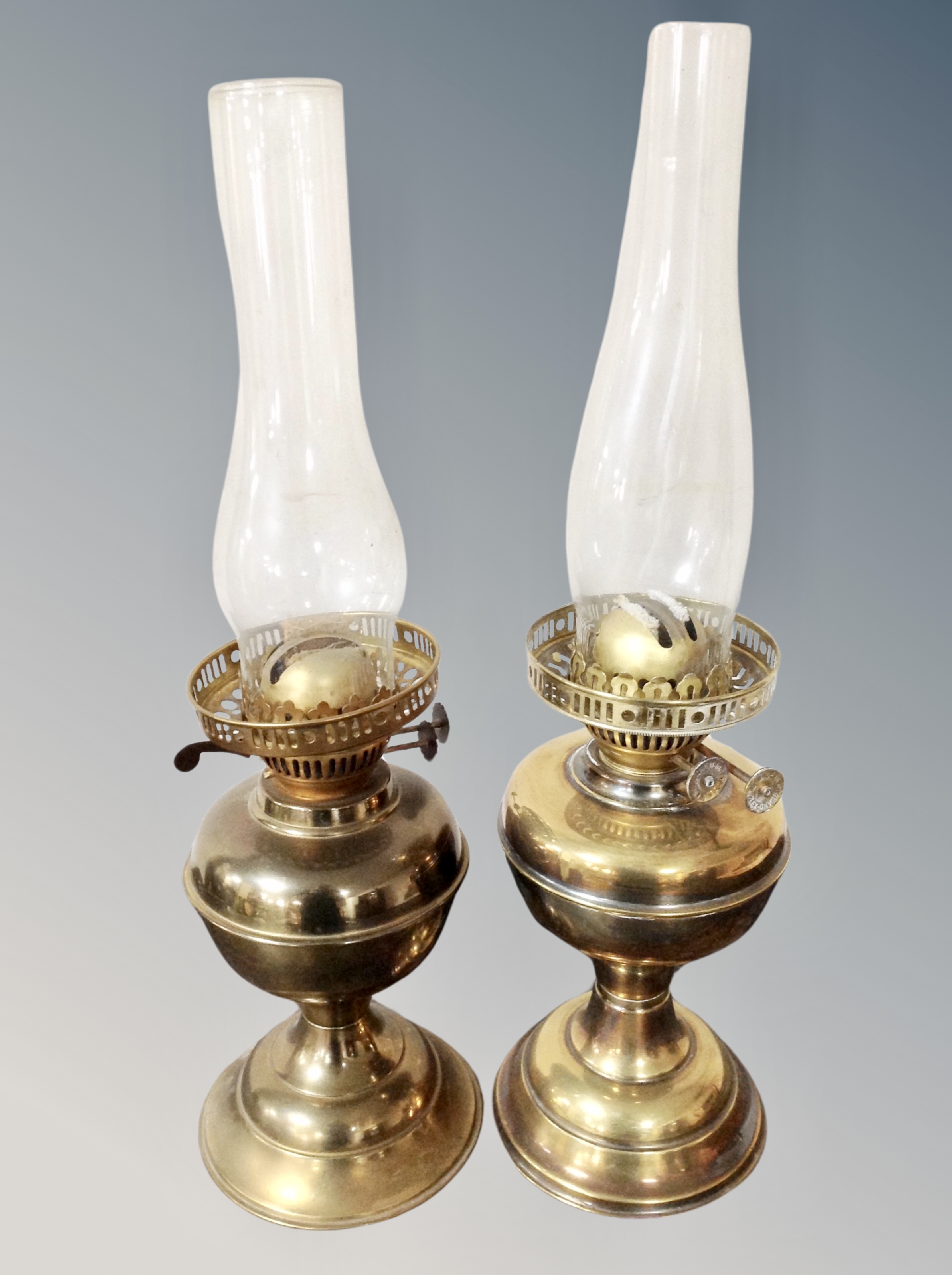 Two brass oil lamps