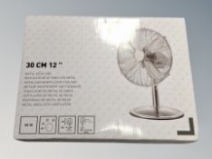 A 30 cm metal desk fan new in box