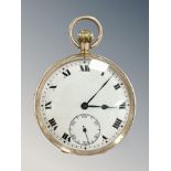 A 9ct gold open faced pocket watch, enamel dial with subsidiary seconds, gold-plated crown,