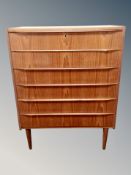 A Danish teak chest of six drawers,