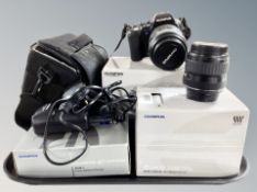 An Olympus E-500 camera with Zuiko digital 40-150 mm lens, further Olympus digital 17.