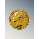 An 1866 Victorian shield back full gold sovereign