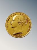 An 1866 Victorian shield back full gold sovereign