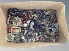 A box of various costume jewellery