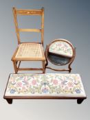 An Edwardian inlaid mahogany bedroom chair together with a rectangular footstool and oval dressing