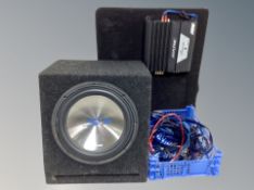 An Alpine sub woofer amp with cases and leads