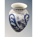 A Chinese style porcelain baluster vase,