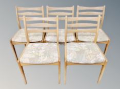 A set of five Danish blond oak ladder backed chairs