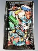 A crate of play worn die cast vehicles,