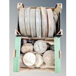 Two boxes of cinema film reels in tins