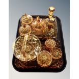 A quantity of amber glass dressing table pieces, basket,