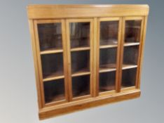 A Danish mahogany four door glazed bookcase,