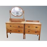 An Edwardian mahogany two drawer dressing chest and matching two drawer chest