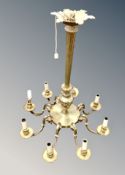 A brass eight branch chandelier,