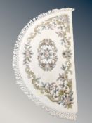 A Chinese demi lune wool rug,