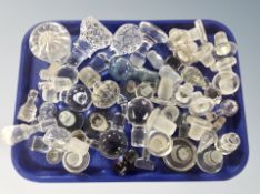 A large quantity of crystal decanter stoppers