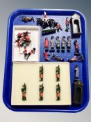 A group of die cast soldiers, Scottish bagpipers, Royal Guards, Horse Guard etc,