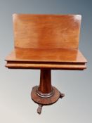 A 19th century mahogany tea table,