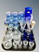 A set of eight blue glass wine glasses, drinking glasses,