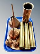 Four brass ammunition shells,