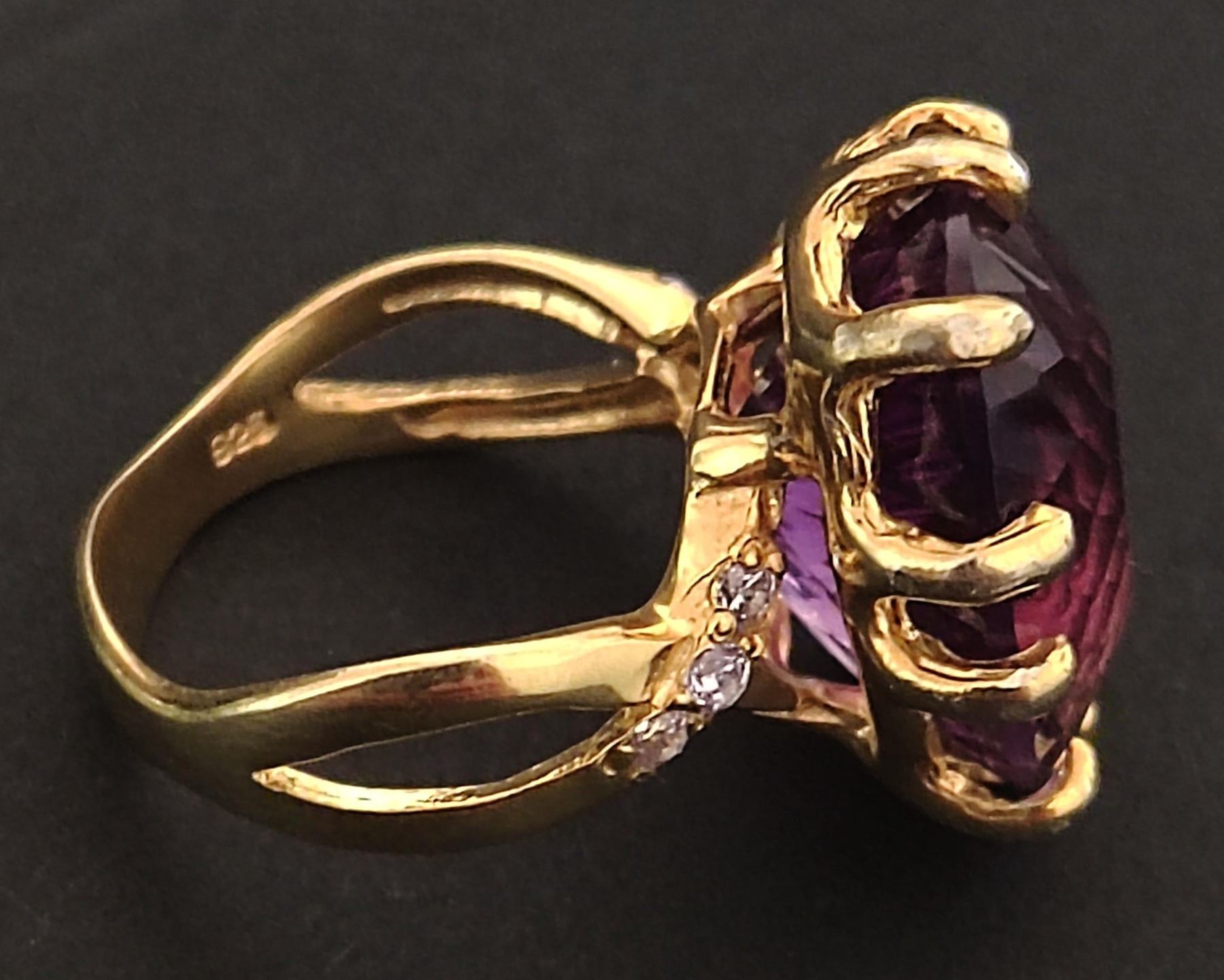 An African silver-gilt amethyst ring, 18x14 mm main stone, with cubic zirconia secondary stones, - Image 2 of 3