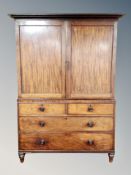 A Regency mahogany linen press,