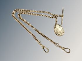 A 9ct gold watch Albert chain with T-bar and locket CONDITION REPORT: The locket