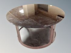 A black glass circular coffee table,