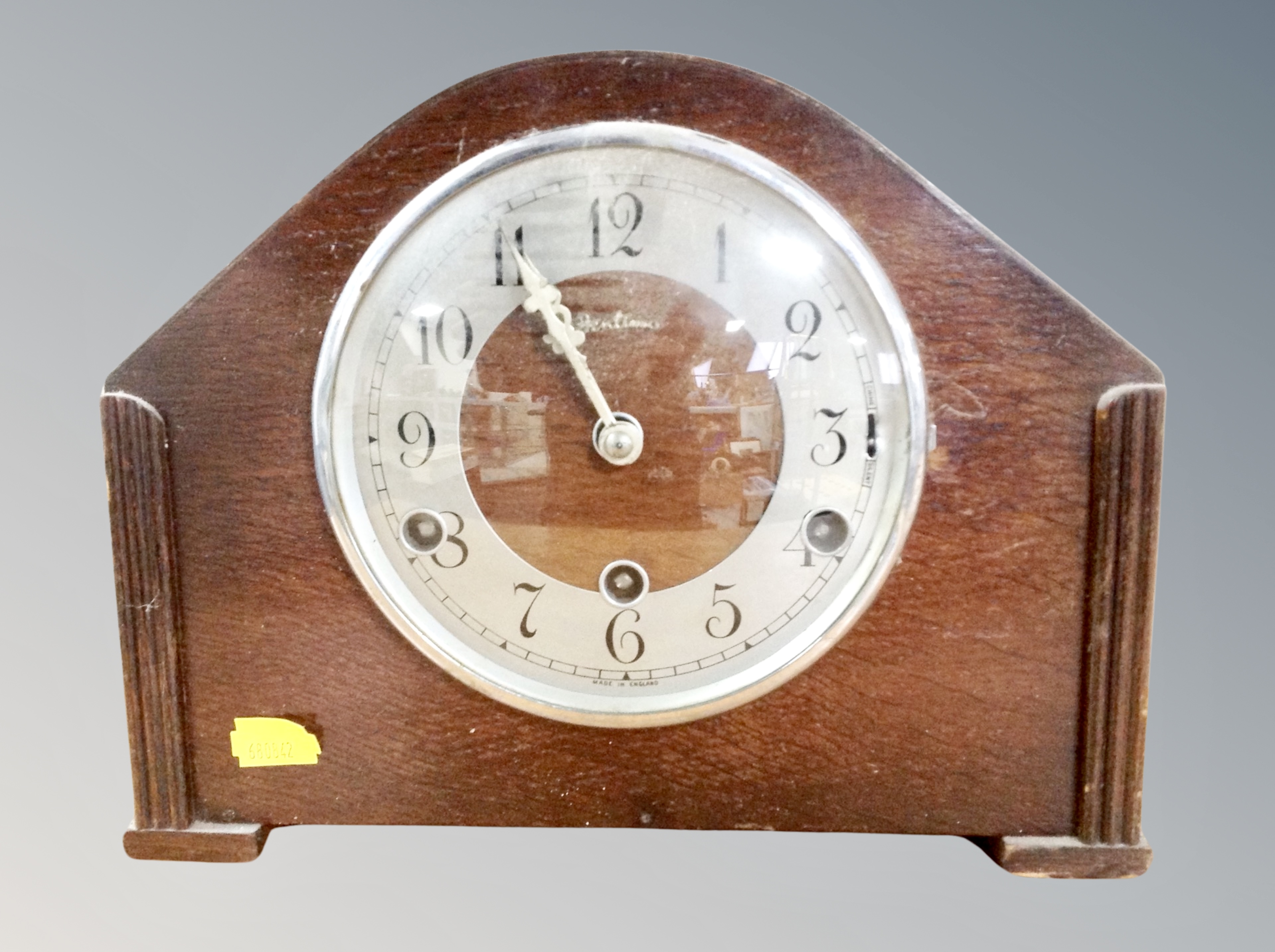 A Bentima eight day oak mantel clock