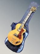 A vintage Hofner hollow body electric guitar with soft carry case